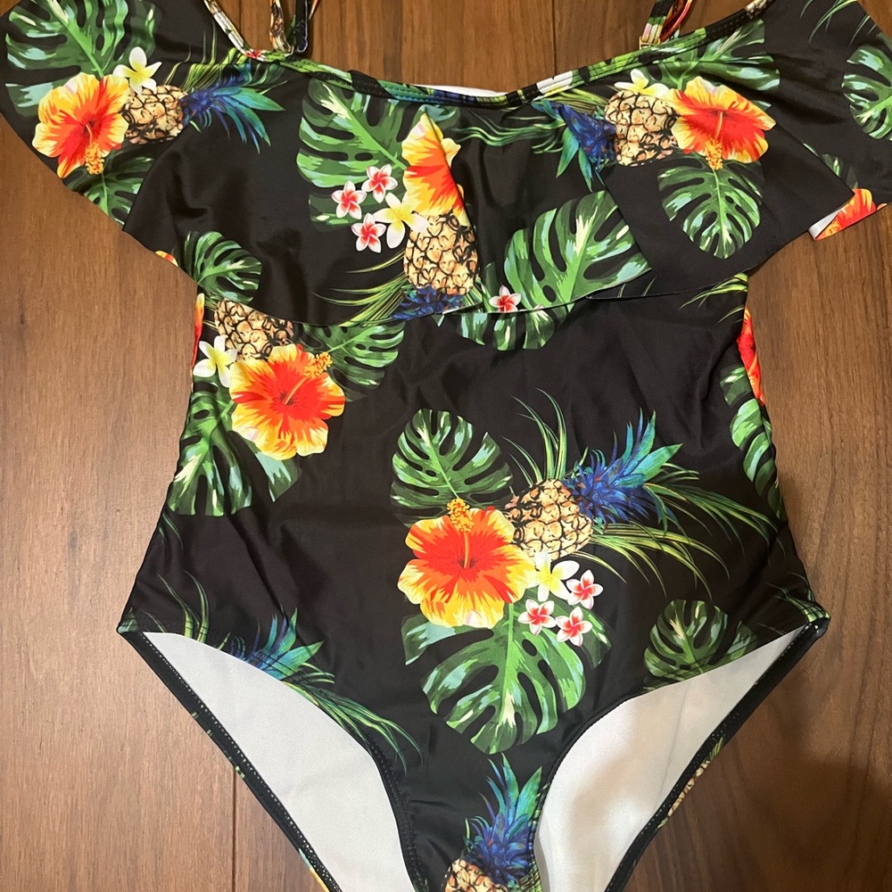 One piece off the shoulder floral swimsuit.